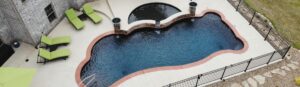 Narellan Pools Encore Fiberglass Swimming Pool with Encore Tanning Ledge in Blue Azurite