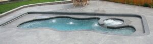 Narellan Pools Monument Fiberglass Swimming Pool with inbuilt automatic pool cover