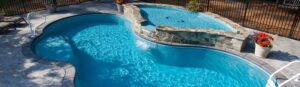 Narellan Pools Resolute Fiberglass Swimming Pool and Resolute Tanning Ledge with in floor art